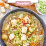 Cheeseburger soup, green onions, relish, bacon bits, and croutons.