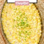 Cheesy creamed corn on top of a mat.
