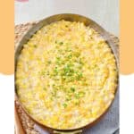 A skillet of cheesy creamed corn.