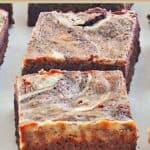 Two cream cheese brownies.