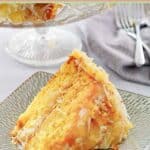 A slice of mountain dew cake with pineapple coconut icing.