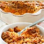 A serving of sweet potato casserole with pecans in a bowl.