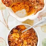 Sweet potato casserole with pecans in a baking dish and in a bowl.