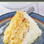 A slice of old fashioned ambrosia cake on a plate.