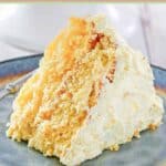 Old fashioned ambrosia cake slice on a plate.