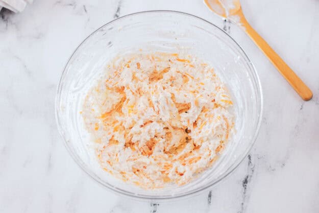 Cold beer cheese dip in a mixing bowl.