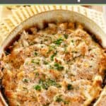 Hot boudin dip served with crackers.