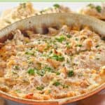 Hot boudin sausage dip in a serving dish.