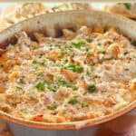 Hot and cheese boudin dip in a serving dish.