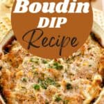 Hot boudin dip with cheese in a serving dish.