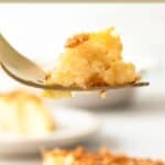 Coconut custard pie on a fork.