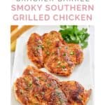 Two copycat Cracker Barrel smoky southern grilled chicken breasts on a platter.
