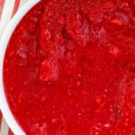 A bowl of cranberry jello salad.