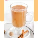 Homemade hot buttered rum in a glass mug.