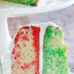 Christmas Jello poke cake slice on a plate.