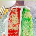 2 layer jello poke cake slice on a plate.