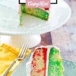 2 layer jello poke cake and a cake stand and a slice on a plate.