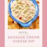 Rotel sausage cream cheese dip in a serving dish and chips around it.