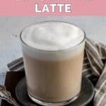 Homemade Starbucks London fog latte on a coaster and a cloth napkin.