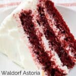 Homemade waldorf astoria red velvet cake slice on a dessert plate.