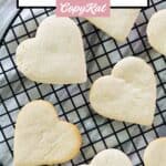 Several cake mix cookies on a wire rack.