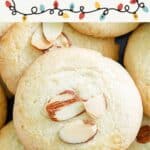 Homemade Chinese almond cookies with slivered almonds on top.