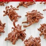 Homemade chocolate butterscotch haystacks on a wood surface.