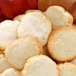 Homemade cream cheese cookies on a kitchen towel.