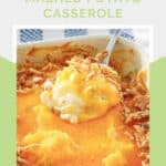 Cheesy mashed potato casserole in a baking dish.