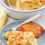 Southern cornbread dressing in a baking dish and on a plate.