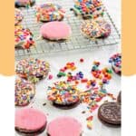 White chocolate covered oreo cookies decorated with sprinkles.