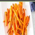 Air fryer carrots on a rectangular platter.