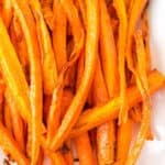 Air fried carrots on a plate.