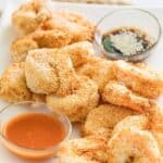 Air fryer shrimp tempura on a rectangular platter.