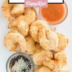 Air fryer shrimp tempura and dipping sauces on a platter.