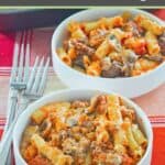 Homemade baked ziti with beef, Italian sausage, and ricotta cheese.