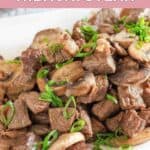 Homemade Benihana steak with mushrooms on a plate.