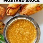 Homemade Benihana magic mustard dipping sauce and egg rolls.