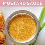 A small bowl of homemade Benihana magic mustard dipping sauce.