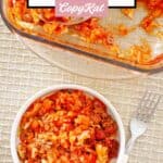 Homemade cabbage roll casserole in a baking dish and a bowl and a fork.