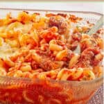 Ground beef casserole in a glass baking dish.