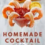 Homemade cocktail sauce and shrimp in a martini glass.