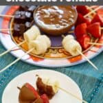 Copycat melting pot chocolate fondue on a platter with fruit.