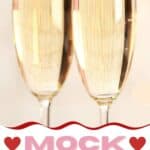 Two glasses of mock champagne on a table.