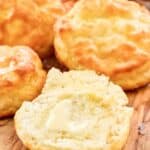 Homemade Popeyes buttermilk biscuits with butter.