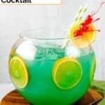 Homemade Bennigan's paddy o' punch cocktail in a fishbowl.