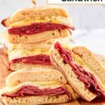 Two corned beef breakfast sandwiches cut in half.
