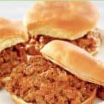A few loose meat sandwiches on a plate.
