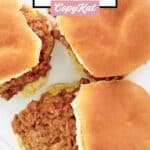 Three loose meat sandwiches on a plate.