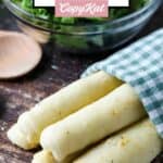Homemade Olive Garden breadsticks and a salad.